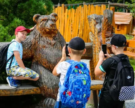 Wooden sculptures and outdoor educational zone